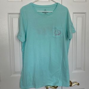 Teal Ivory Ella tee with sunset elephant on the back.